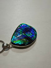 Load image into Gallery viewer, Beautiful ammolite necklace set in silver, featuring vibrant blues and greens
