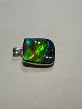 Load image into Gallery viewer, Beautiful ammolite necklace set in silver, with vibrant blues and oranges
