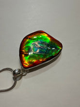 Load image into Gallery viewer, Beautiful ammolite necklace set in silver, featuring vibrant reds, yellows and blues
