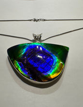 Load image into Gallery viewer, Beautiful ammolite necklace set in silver, featuring vibrant blues and purples
