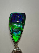 Load image into Gallery viewer, Beautiful hand-polished ammolite necklace set in silver, featuring bright vibrant blues and greens
