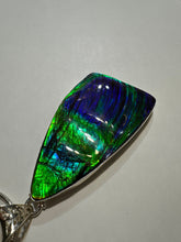 Load image into Gallery viewer, Beautiful hand-polished ammolite necklace set in silver, featuring bright vibrant blues and greens
