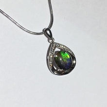 Load image into Gallery viewer, Small Ammolite pendant set in Sterling Silver with Cubic Zirconia.  Very cute &amp; dainty.
