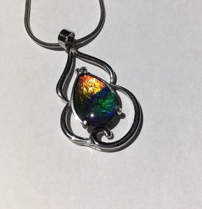 Ammolite pendant in Sterling Silver with vibrant rainbow colours