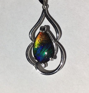 Ammolite pendant in Sterling Silver with vibrant rainbow colours