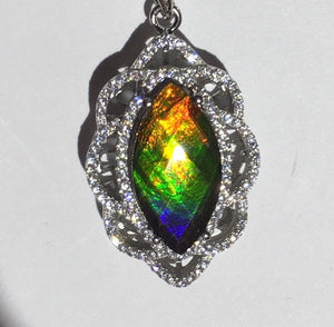 Ammolite pendant faceted in Sterling Silver with Cubic Zirconia