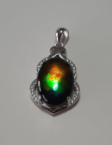 Stunning AAA Grade Ammolite pendant with perfect colour set in Sterling Silver and rhodium plated