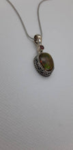 Load image into Gallery viewer, Ammolite pendant Sterling Silver with garnet
