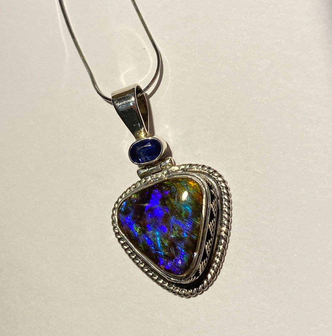 Ammolite pendant in Sterling Silver vibrant blue flash