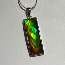 Load image into Gallery viewer, Ammolite pendant in Sterling Silver with very bright rainbow colours
