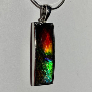 Ammolite pendant faceted set in Sterling Silver