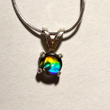 Load image into Gallery viewer, Ammolite pendant set in  Sterling Silver with vibrant rainbow flash
