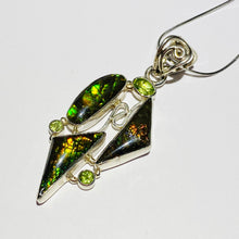 Load image into Gallery viewer, Ammolite pendant in Sterling Silver with peridot gemstone.
