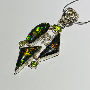 Ammolite pendant in Sterling Silver with peridot gemstone.