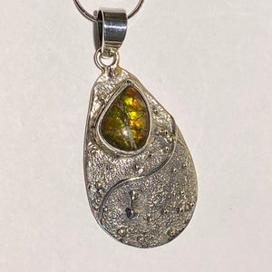 Ammolite pendant in Sterling Silver with modern design and sparkling colours