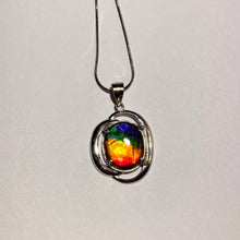 Load image into Gallery viewer, Ammolite pendant in Sterling Silver with beautiful bright rainbow colours!
