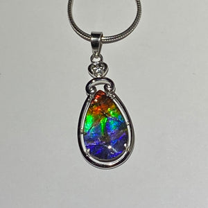 Ammolite pendant Rainbow colours with incredible lustre and flash  in Sterling Silver with cubic zirconia