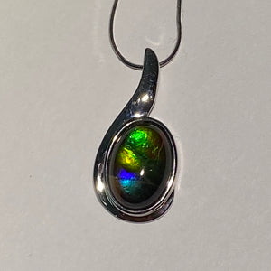 Ammolite pendant with beautiful orange, gold, green, blue and indigo set in Sterling Silver