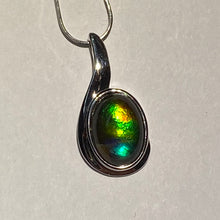 Load image into Gallery viewer, Ammolite pendant with beautiful orange, gold, green, blue and indigo set in Sterling Silver
