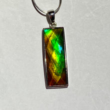 Load image into Gallery viewer, Ammolite pendant in Sterling Silver with very bright rainbow colours

