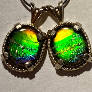 Ammolite pendant set in Sterling Silver with Beautiful rainbow colours