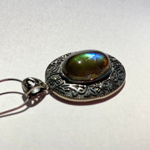 Load image into Gallery viewer, Ammolite pendant in Sterling Silver with beautiful green and blue shine.
