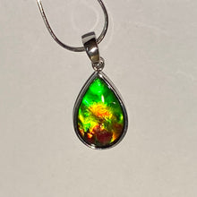 Load image into Gallery viewer, Ammolite pendant, vibrant green, yellow and red in sterling silver setting
