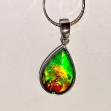 Load image into Gallery viewer, Ammolite pendant, vibrant green, yellow and red in sterling silver setting
