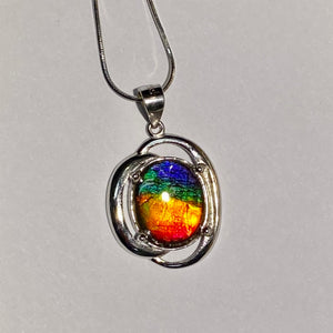 Ammolite pendant in Sterling Silver with beautiful bright rainbow colours!