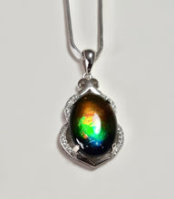 Load image into Gallery viewer, Stunning AAA Grade Ammolite pendant with perfect colour set in Sterling Silver and rhodium plated
