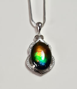 Stunning AAA Grade Ammolite pendant with perfect colour set in Sterling Silver and rhodium plated