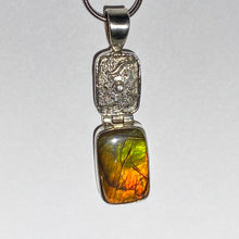 Load image into Gallery viewer, Ammolite pendant in Sterling Silver with bright orange, green and red
