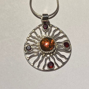 Ammolite pendant Sterling Silver with Garnet (chain not included)