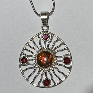Ammolite pendant Sterling Silver with Garnet (chain not included)
