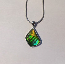 Load image into Gallery viewer, Ammolite pendant in Sterling Silver with gorgeous greens and blues, flashes of gold
