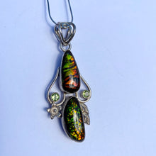 Load image into Gallery viewer, Beautiful ammolite pendant in Sterling silver with peridots
