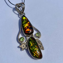 Load image into Gallery viewer, Beautiful ammolite pendant in Sterling silver with peridots
