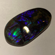 Load image into Gallery viewer, Glowing and deep purple, blue, green, aqua ammolite free form 56x32x6 mm
