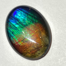 Load image into Gallery viewer, AAA+ ammolite calibrated cabochon. Beautiful rainbow colours. 30x 22 mm low dome quartz cap
