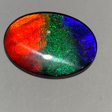 Load image into Gallery viewer, AAA+ ammolite calibrated cabochon. Beautiful red, sparkling aqua and blue colours. 25x19 mm low dome quartz cap
