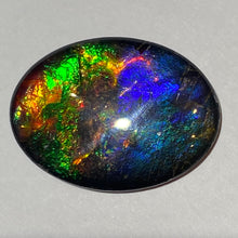 Load image into Gallery viewer, AAA+ ammolite calibrated cabochon. Beautiful pink spots and rainbows. 30x22 mm low dome quartz cap
