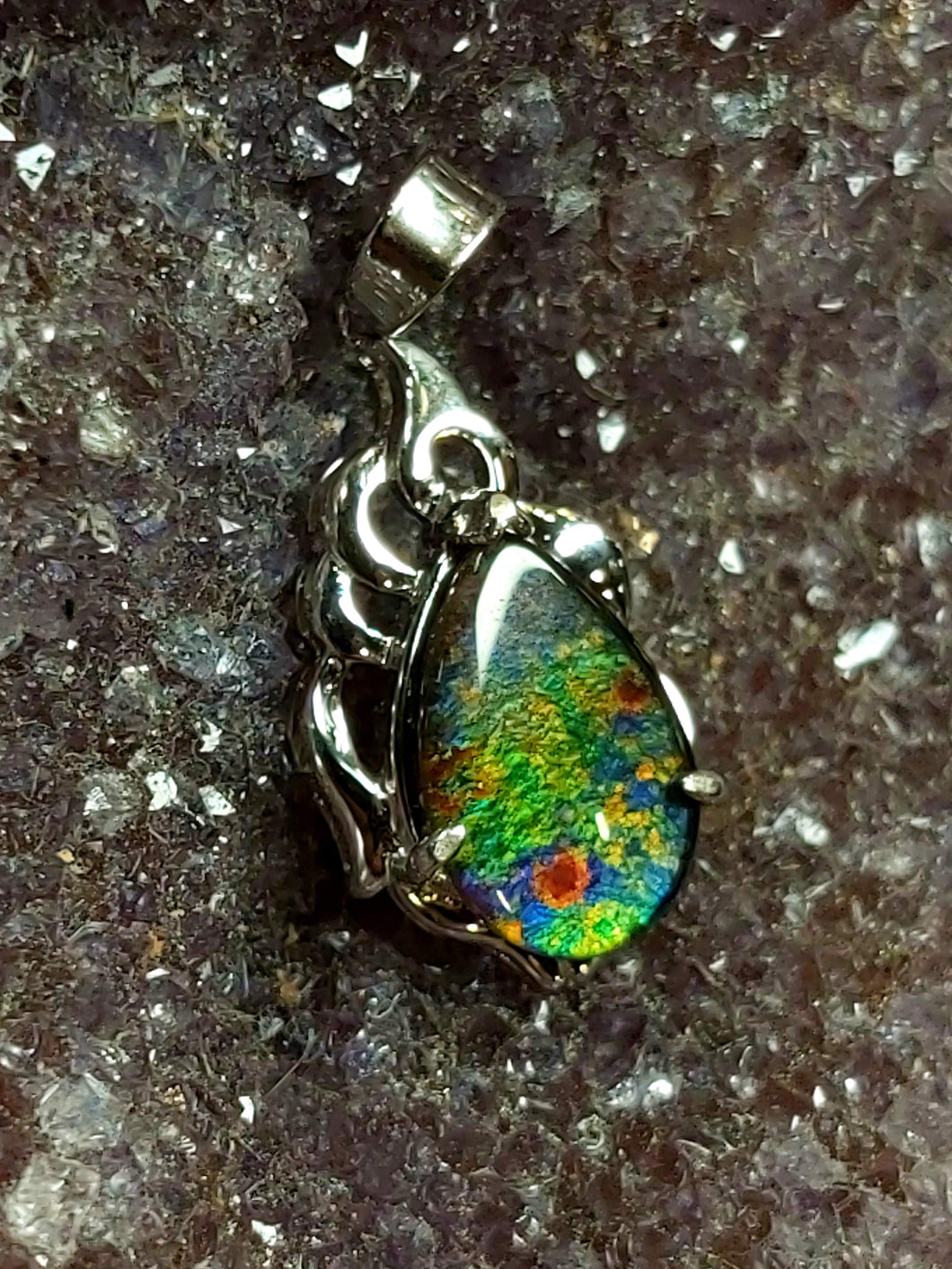 Ammolite Pendant small tear drop absolutely amazing unique colors and patterns